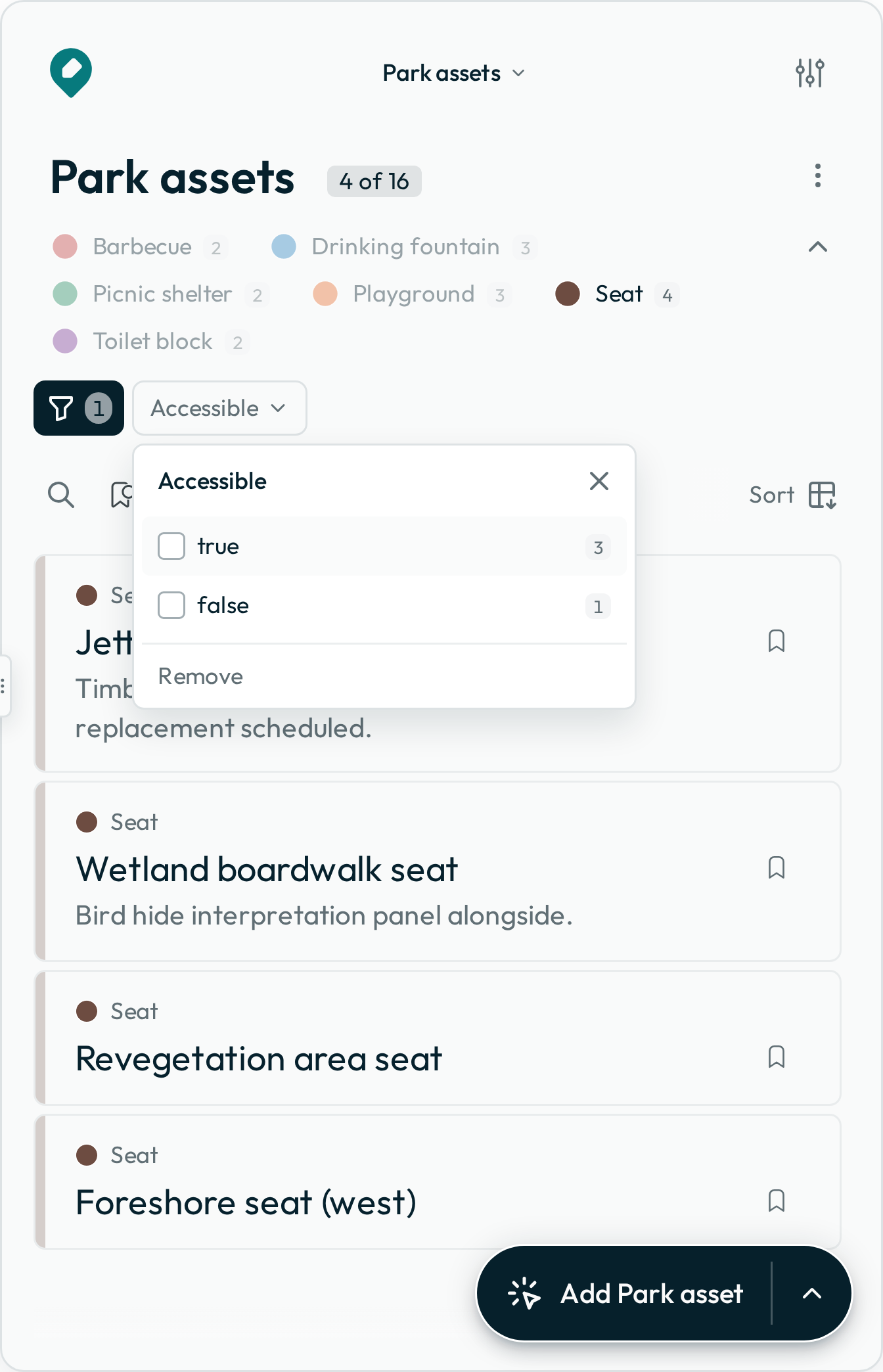A layer filtered from its legend: the Seat chip lit and the other asset types dimmed below the layer name, the row of filter buttons below that, and the Accessible button's list open with a tick box against each value and the count of features carrying it.